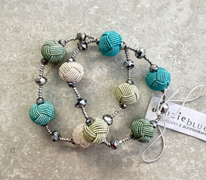 Dc1306 Elasticated Bracelet with wrapped thread balls